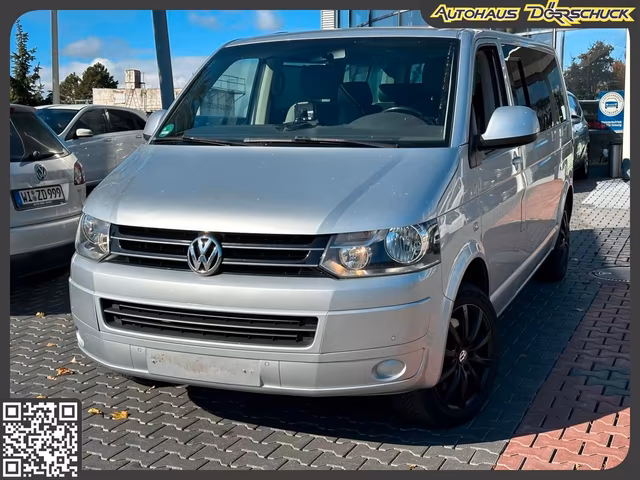 Volkswagen T5 Caravelle 2.0 TDI 8-Sitzer Klima PDC Automati - Ansicht 1 von 1. Gebrauchtwagen Detailaufnahme bei Autohaus Dörrschuck Mainz.
